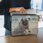 Happy Pug  at the Beach Laptop Sleeve<br><div class="desc">Keep your device stylishly protected with this vibrant laptop sleeve featuring a cheerful pug enjoying a sunny beach day. The playful design showcases a sandy shoreline and ocean waves, brought to life with rich colours and fun character. Ideal for students, commuters, or anyone who loves dogs and bold, eye-catching accessories,...</div>