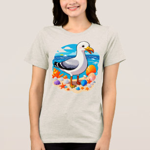 Happy Seagull on Sandy Beach With Colourful Seashe Tri-Blend Shirt