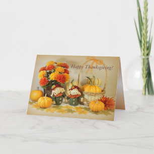 Happy Thanksgiving card with two cute scarecrows