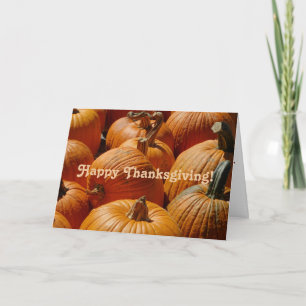 Happy Thanksgiving on a pumpkin background on a Card