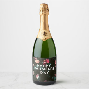 Happy women's day text on floral sparkling wine label