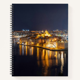 Harbor in Malta illuminated at night Notebook