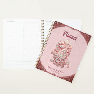 Harmony in pink, a majestic, stylised treble clef. planner