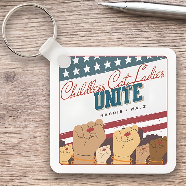 Harris Walz Childless Cat Ladies Unite Fists Key Ring (Harris Walz Childless Cat Ladies Unite Fists Keychain on a Desk)