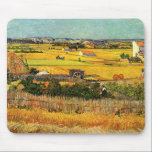 Harvest at La Crau, Montmajour by Vincent van Gogh Mouse Mat<br><div class="desc">Harvest at La Crau, with Montmajour in the Background by Vincent van Gogh is a vintage fine art post impressionism landscape nature painting. A view of farms with haystacks during harvest time in the autumn season. About the artist: Vincent Willem van Gogh (1853 -1890) was one of the most famous...</div>