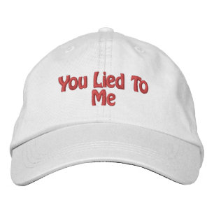 hat reads "YOU LIED TO ME"