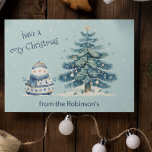 Have A Cosy Christmas Family Snowman Holiday Card<br><div class="desc">Have A Cosy Christmas Family Snowman And Christmas Tree Christmas Card. Personalise with your family name.</div>