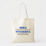 Have a Pawsitively Wonderful Hanukkah Tote Bag<br><div class="desc">This delightful design showcases the heartfelt text "Have a pawsitively wonderful Hanukkah." The text is presented in blue and silver colours, with the letter "o" in "wonderful" playfully substituted with a paw print. This design captures the joy and celebration of Hanukkah with a pet-friendly twist. The combination of blue and...</div>