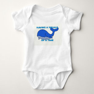 Having a whale of a time. baby bodysuit