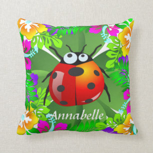 Hawaiian ladybug standing on a four leaf clover cushion