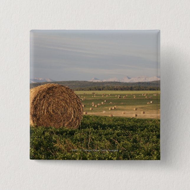 Hay Bales In A Field With Mountains At Sunrise 15 Cm Square Badge (Front)