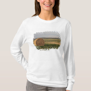 Hay Bales In A Field With Mountains At Sunrise T-Shirt