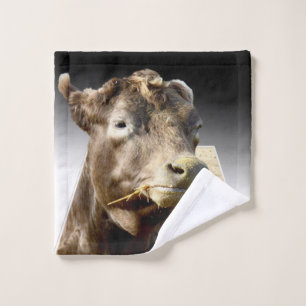 Hay Day: A Brown Cow’s Munching Moment in Pop-Out Wash Cloth