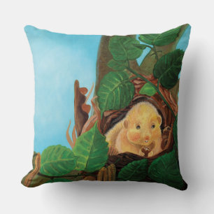 Hazel dormouse eating hazelnut cushion
