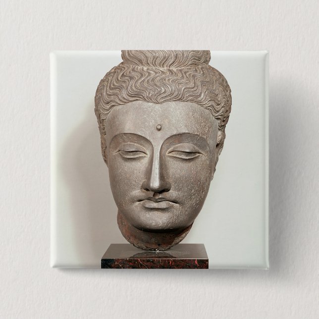 Head from a statue of the Buddha, from 15 Cm Square Badge (Front)
