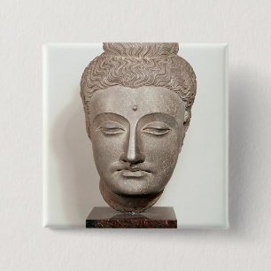 Head from a statue of the Buddha, from 15 Cm Square Badge