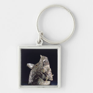 Head of an animal with human head in open jaws key ring