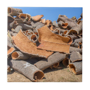 Heap of cork tree bark as raw material.JPG Tile