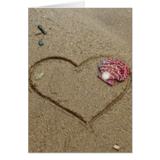 heart and shell on beach