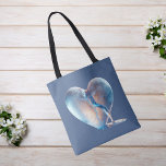 Heart Broken Blue Tote Bag<br><div class="desc">This stunning design features a heart that resembles translucent glass,  delicately cracked halfway through,  with crystal-clear water flowing gracefully from within. Set against a serene blue background,  this unique digital artwork adds a contemporary and ethereal touch to any space.</div>