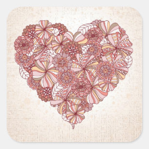 Heart made of hand drawn flowers square sticker