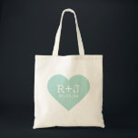 Heart Monogram Wedding Favour Tote Bag<br><div class="desc">Cute girly bold graphy modern heart shape design with the bride and groom's personalised monogram initials and custom wedding date. Perfect for wedding favour tote bags, Valentine's Day, anniversary gift or any occasion! Click the "Customise It" button to add your own custom text and change fonts and colours for a...</div>