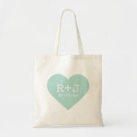 Heart Monogram Wedding Favour Tote Bag<br><div class="desc">Cute girly bold graphy modern heart shape design with the bride and groom's personalised monogram initials and custom wedding date. Perfect for wedding favour tote bags, Valentine's Day, anniversary gift or any occasion! Click the "Customise It" button to add your own custom text and change fonts and colours for a...</div>