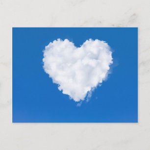 Heart shaped cloud in blue sky postcard