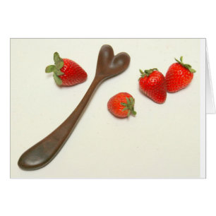 Heart spoon and strawberries