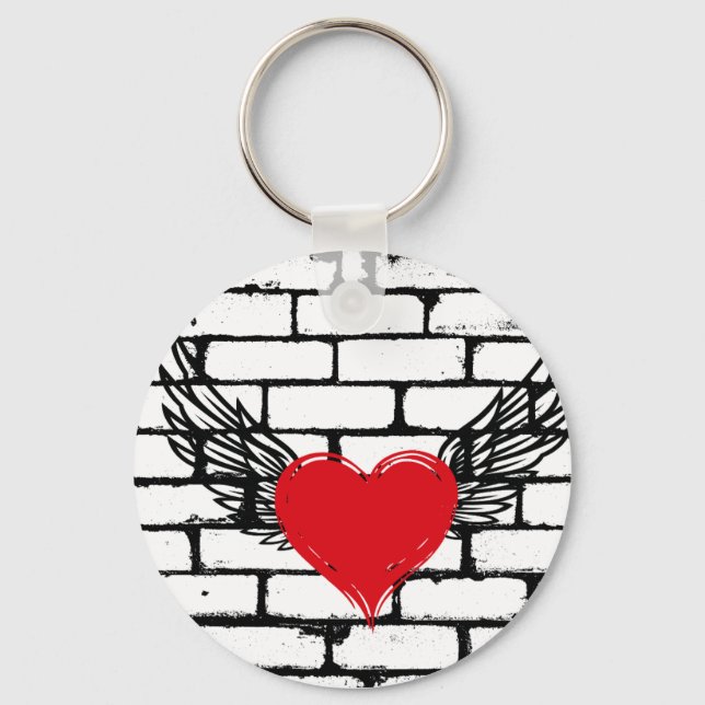 Heart W/ Wings on brick wall.  Key Ring (Front)