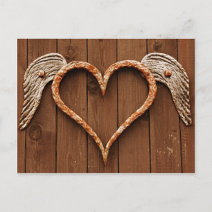 Heart with Wings Against Rustic Wooden Boards Postcard