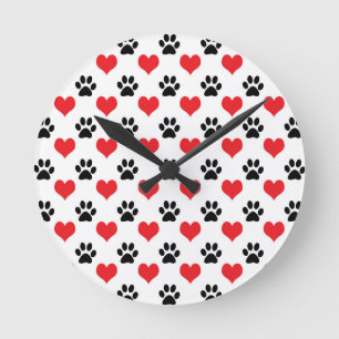Hearts and paw prints pattern round clock