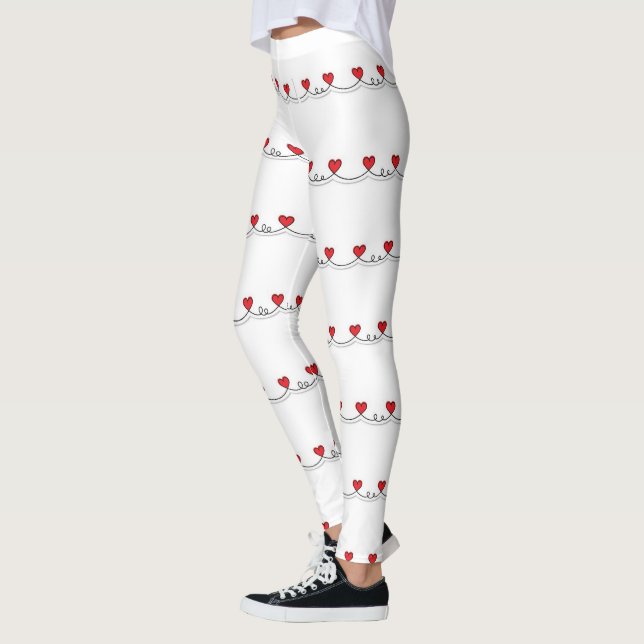 **HEARTS ON A STRING GALORE** CHRISTMAS LEGGINGS (Left)