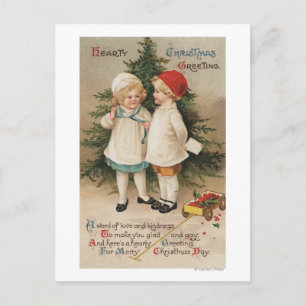 Hearty Christmas GreetingKids by a Tree Holiday Postcard
