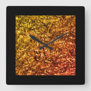 Heated foil on black square wall clock