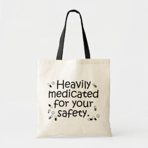 Heavily medicated for your protection tote bag