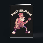 Heavy Christmas Rock Santa Card<br><div class="desc">Christmas themed t-shirt design featuring an illustration of a cool santa rocking out with a deer guitar and the caption "Heavy Christmas". For Heavy Metal and Rock fans a great X-Mas gift</div>