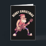 Heavy Christmas Rock Santa Card<br><div class="desc">Christmas themed t-shirt design featuring an illustration of a cool santa rocking out with a deer guitar and the caption "Heavy Christmas". For Heavy Metal and Rock fans a great X-Mas gift</div>