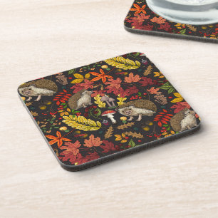 Hedgehogs and autumn forest flora on black coaster