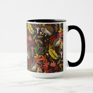 Hedgehogs and autumn forest flora on black mug