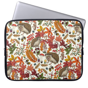 Hedgehogs and autumn forest flora on ivory laptop sleeve