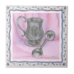Heirloom Cup & Rattle on Purple Background Tile<br><div class="desc">An heriloom cup sits next to a baby rattle in this work by Tara Friel. A figure of a teddy bear is carved into the end of the rattle,  and intricate floral patterns are adorn the sides of the cup. A great piece,  put this on your wall today!</div>
