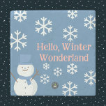 Hello, Winter Wonderland Stone Coaster<br><div class="desc">A Slice of Life and Delight presents Winter Wonderland stone coasters with a snowman decorated with white snowflakes,  pink writing,  and a blue backdrop. The snowman coasters also have a blue hat and scarf.</div>