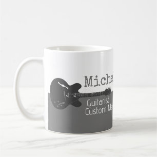 her professional (guitarist) half-grey half-white coffee mug