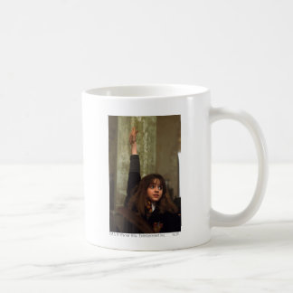 Hermione raises her hand coffee mug