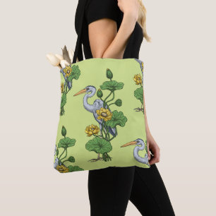 Heron in the Yellow Lotus Garden on honey dew Tote Bag