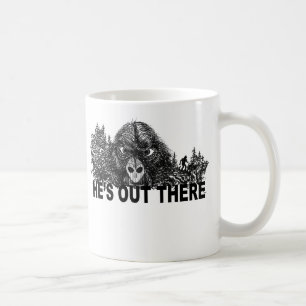 HEs OUT THERE coffee mug