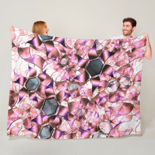 Hexagons surrounded by pinkish petal-like shapes fleece blanket