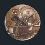 HG Wells sitting in Time Machine Round Clock<br><div class="desc">Wall Clock - HG Wells sitting in Time Machine</div>