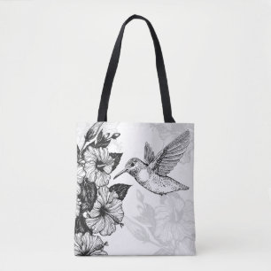 Hibiscus and hummingbird tote bag